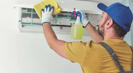 how often to service AC in Ajman