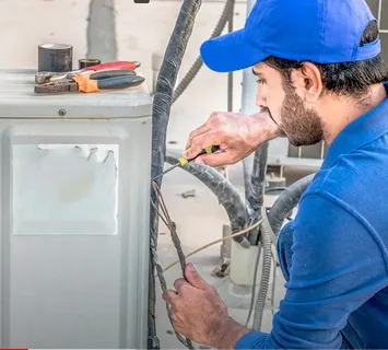 What does AC servicing include in Al Muwaihat